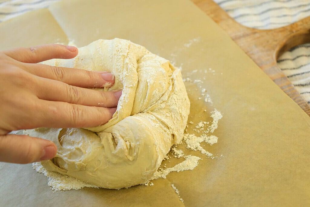 olding-corners-of-dough-into-the-center-of-the-ball